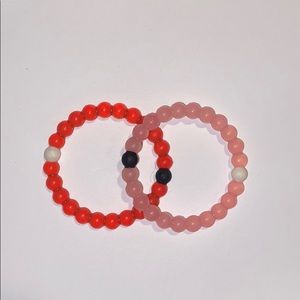 Red and pink Lokai Bracelets